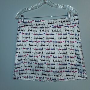Izod Women's Golf Skort with Golf Cart Print - White and Pink